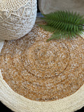 Round block printed jute rug.