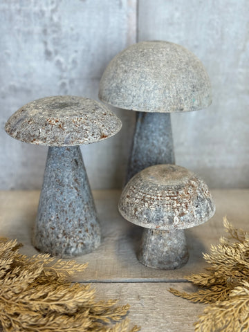 Antique iron mushrooms