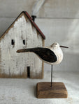 Small seagull on a stand