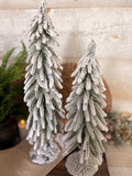 Snowy metal stand tree