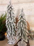 Snowy metal stand tree