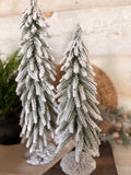 Snowy metal stand tree