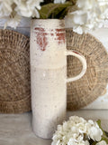 The textured terracotta jug vase