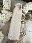 The textured terracotta jug vase