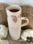 The textured terracotta jug vase