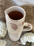 The textured terracotta jug vase