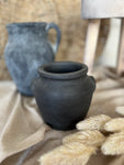 The burnt terracotta pot