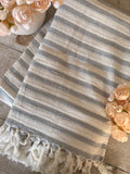 The cotton stripped throw