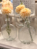The clear glass bud vase