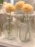 The clear glass bud vase