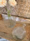 The clear glass bud vase