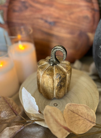 The carved wood pumpkin
