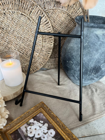 The metal frame stand