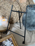 The metal frame stand