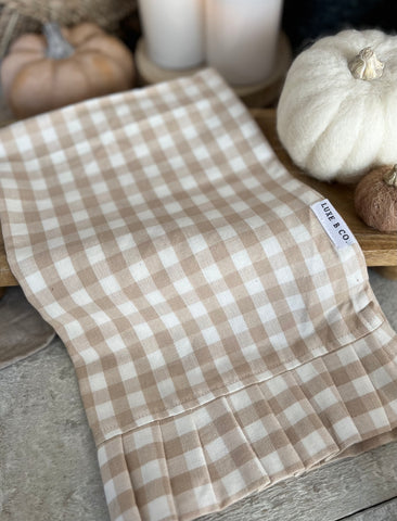 The pleated checkered tea towel