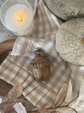 The wooden acorn