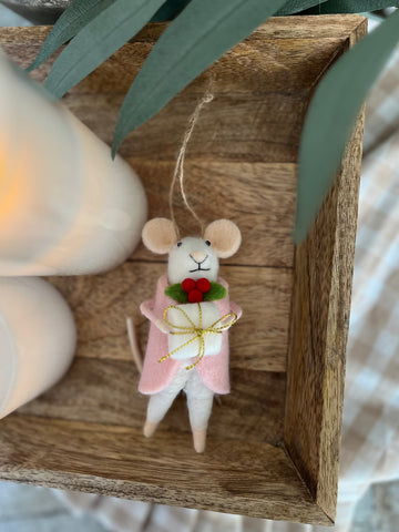 Gifting Gracie the mouse ornament