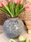 The round vintage floral vase