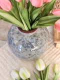 The round vintage floral vase