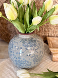 The round vintage floral vase