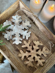 The wooden snowflake ornament