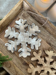 The wooden snowflake ornament