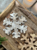 The wooden snowflake ornament