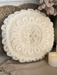 The round flower stitched pillow