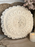 The round flower stitched pillow