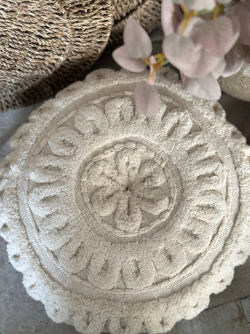 The round flower stitched pillow