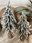 The snowy log stump tree