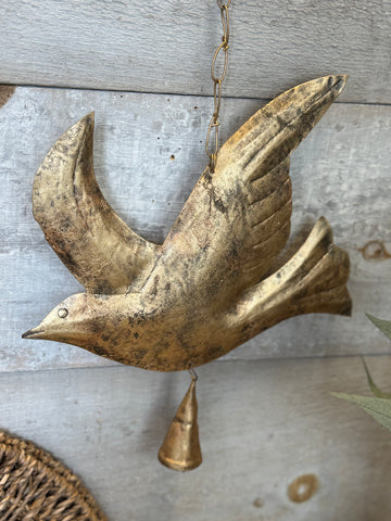 The hanging metal bird bell