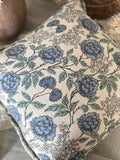 Handwoven floral fringe pillow