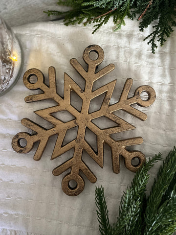 The gold snowflake trivet