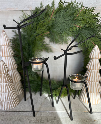 The metal reindeer tea light holder