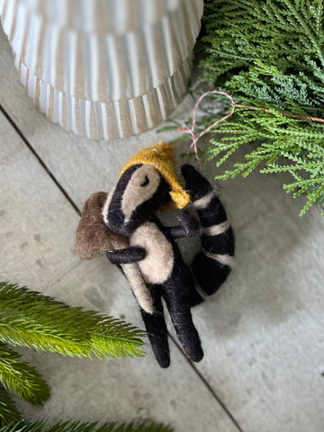 The mushroom raccoon ornament