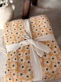 The Daisy print throw
