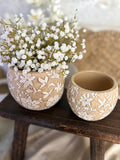 The carved flower pot