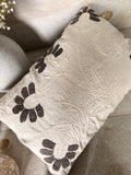 The Daisy stitched pillow