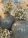 The round vintage floral vase
