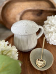 White mushroom mug