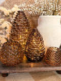 Pinecone candle holder
