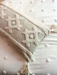 The stitched tassel pillow
