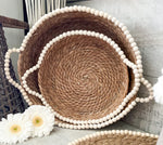 The beaded seagrass baskets