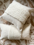 The ivory knit pillow
