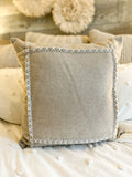 The x stitched pillow