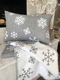 The grey snowflake pillow