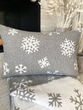 The grey snowflake pillow