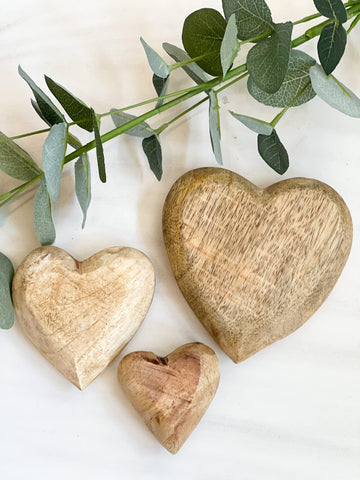 The carved wood hearts