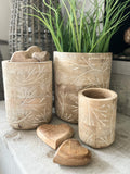 The wooden botanical vases